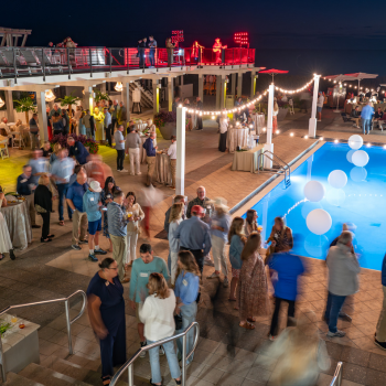 Owners gathered for reception on pool deck